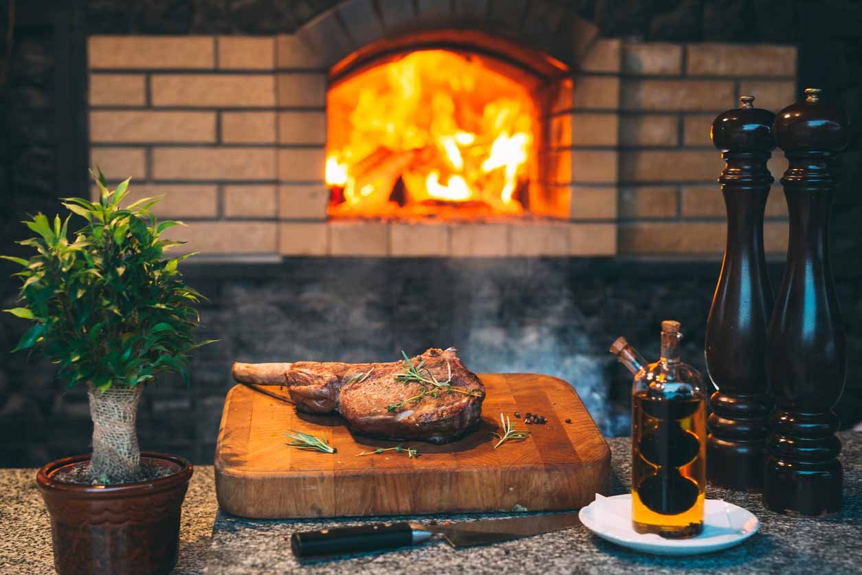 Person Cooking on Live Fire