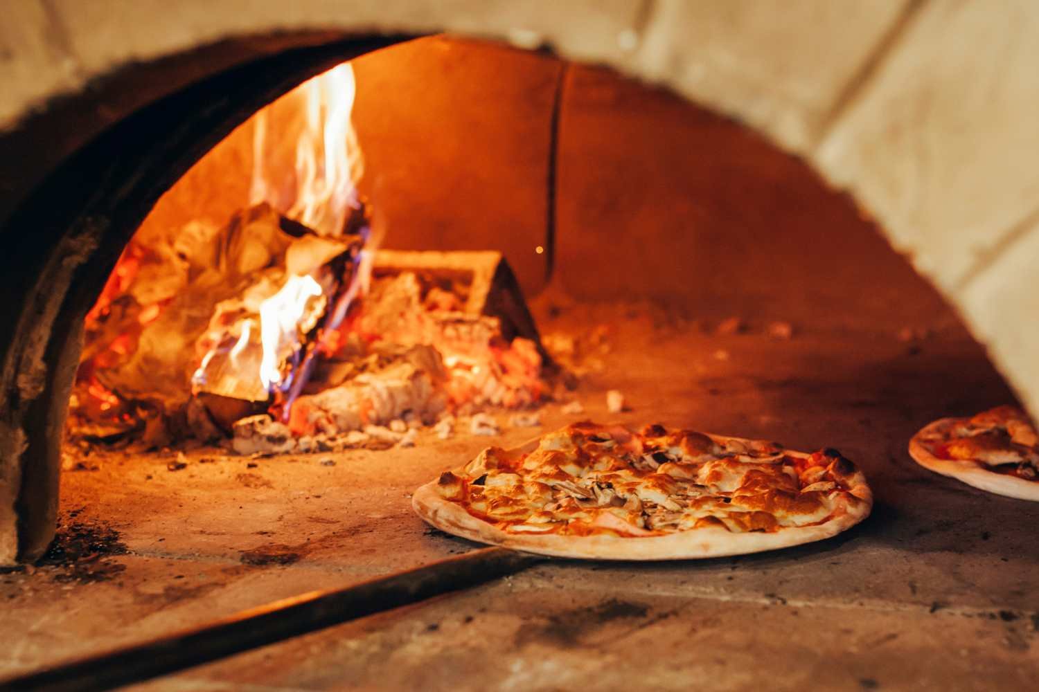 Benefits of Using Kiln-Dried Wood for Pizza Ovens